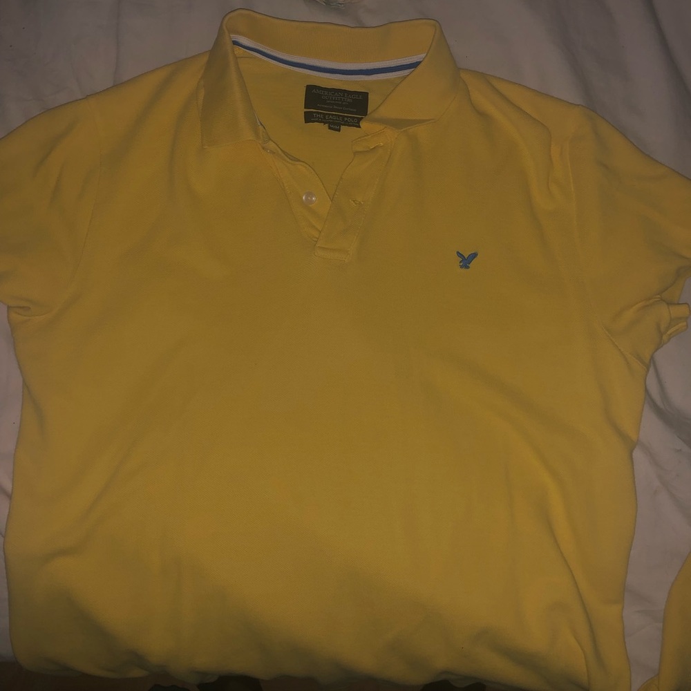 Selling yellow American eagle shirt.